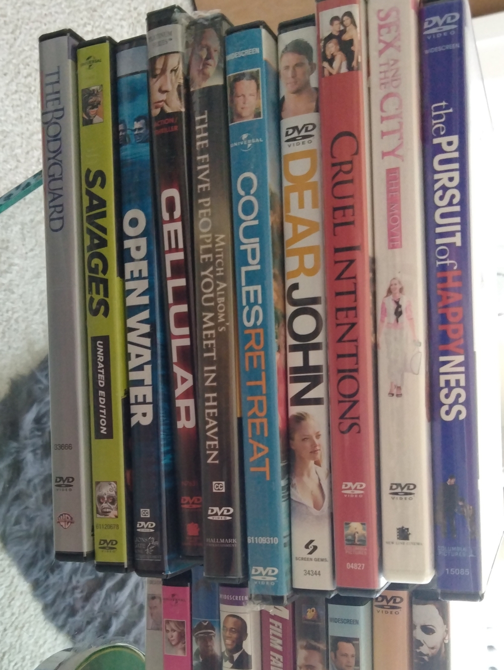 Assorted DVD Movie Collection - Blue & White Spines